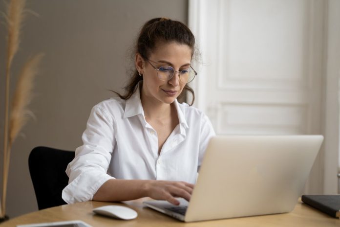 woman-freelancer-work-in-office-surf-the-internet